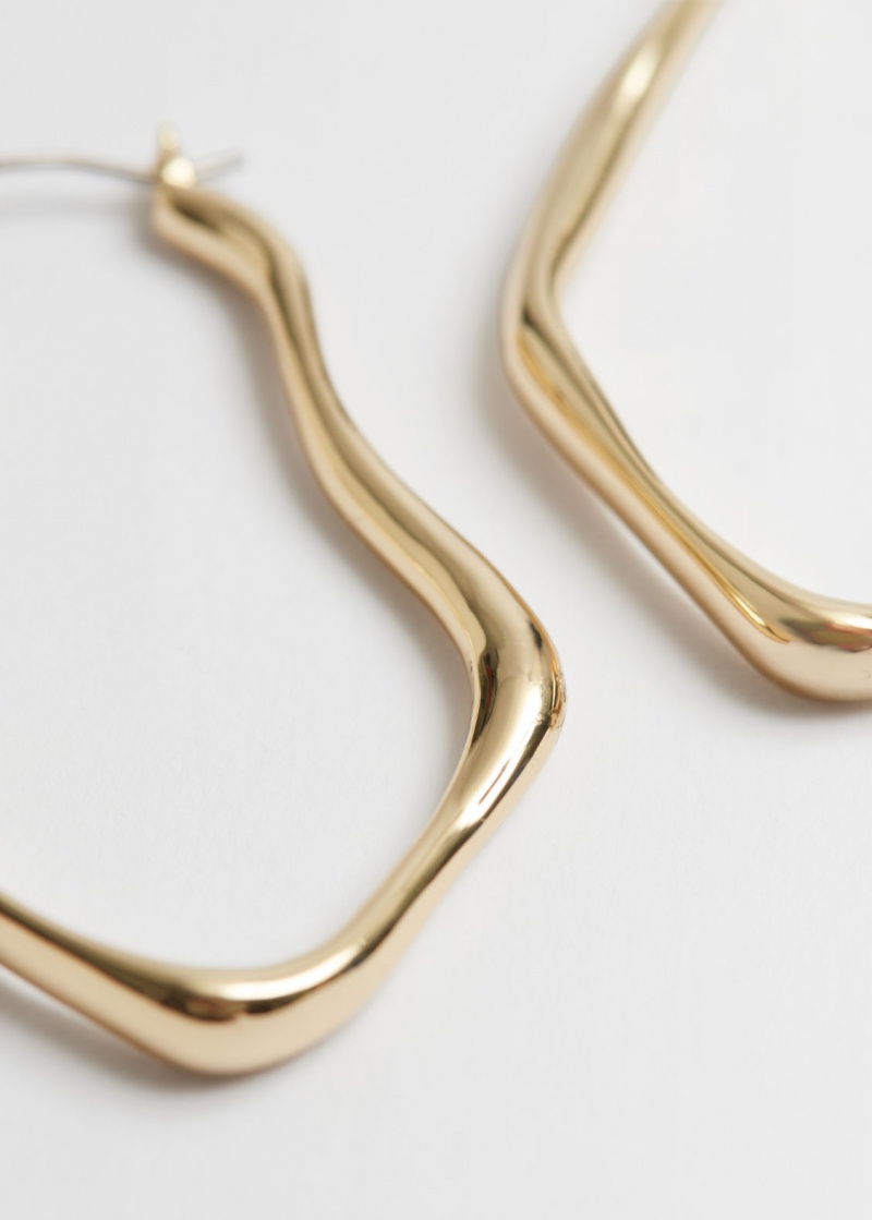 & Other Stories Asymmetric Hoop Earrings Oro | NOS-SN114676